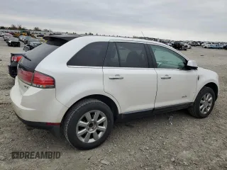2009 Lincoln MKX with VIN 2LMDU68C79BJ12359, listed as a Copart auction lot 81906694 with 215,549 mi miles and Salvage Title. Bid and sale history available at DreamBid. Image 3.