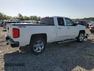 2014 Chevrolet Silverado 1500 LTZ with VIN 1GCVKSEC9EZ227270, listed as a Copart auction lot 51904465 with 95,535 mi miles and Salvage Title. Bid and sale history available at DreamBid. Image 3.