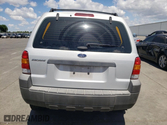 2007 Ford Escape XLS z VIN 1FMYU02Z97KC06172, wystawiony jako Copart lot #56978575 z przebiegiem 155 456 mil mil oraz Szkoda całkowita • Salvage title. Historia ofert i sprzedaży dostępna na DreamBid. Obrazek 6.