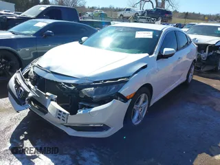 2020 Honda Civic Sedan LX with VIN 19XFC2F63LE019596, listed as a IAAI auction lot 41770281 with 92,370 mi miles. Bid and sale history available at carsss.com. Image 17.