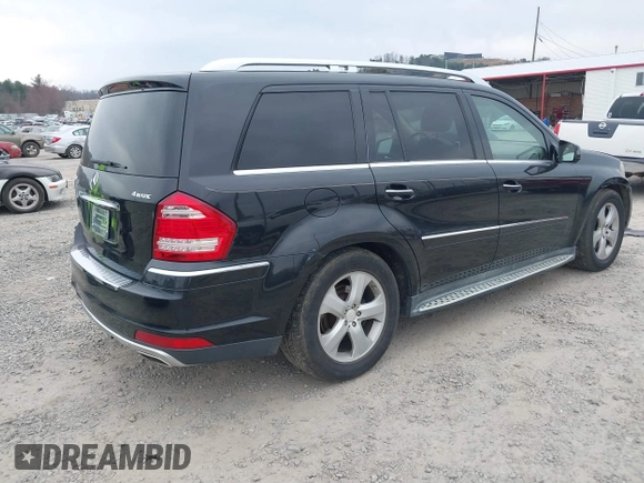 2011 Mercedes-Benz GL-Class GL 450 with VIN 4JGBF7BE9BA649538, listed as a IAAI auction lot 41789876 with 164,423 mi miles. Bid and sale history available at carsss.com. Image 4.