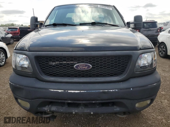 1999 Ford F-150 XL z VIN 1FTRX18L1XKB84628, wystawiony jako Copart lot #63050765 z przebiegiem Nie podano mil oraz Czysty tytuł • Clean title. Historia ofert i sprzedaży dostępna na DreamBid. Obrazek 5.