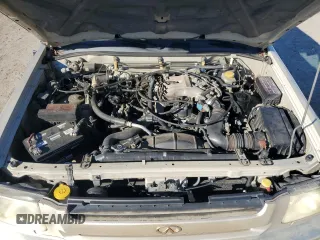 2000 Infiniti QX4 z VIN JNRAR07Y4YW085424, wystawiony jako Copart lot #81091324 z przebiegiem 202 157 mil mil oraz Szkoda całkowita • Salvage title. Historia ofert i sprzedaży dostępna na DreamBid. Obrazek 12.