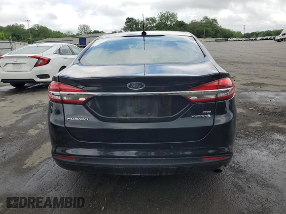 2018 Ford Fusion SE z VIN 3FA6P0LU8JR264630, wystawiony jako Copart lot #57036345 z przebiegiem 234 757 mil mil oraz Szkoda całkowita • Salvage title. Historia ofert i sprzedaży dostępna na DreamBid. Obrazek 6.