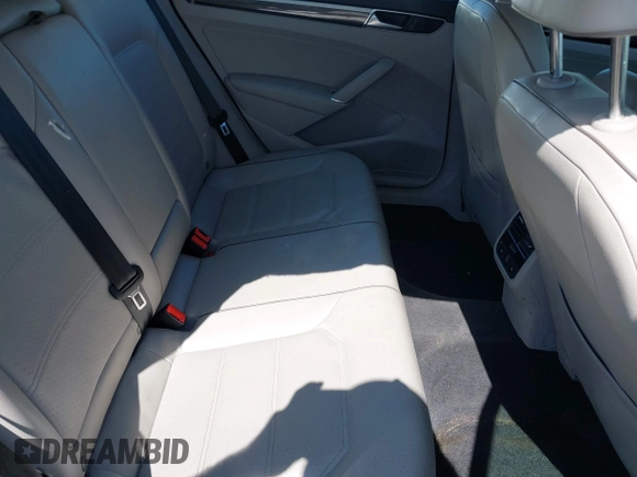 2016 Volkswagen Passat SE z VIN 1VWBS7A36GC047480, wystawiony jako IAAI lot #41685321 z przebiegiem 121 379 mil mil oraz . Historia ofert i sprzedaży dostępna na DreamBid. Obrazek 8.