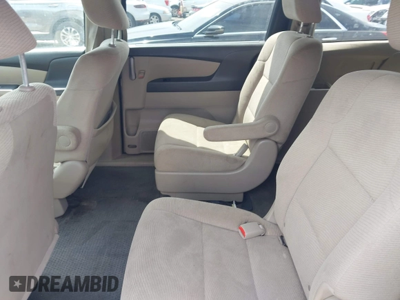 2012 Honda Odyssey LX z VIN 5FNRL5H28CB096385, wystawiony jako IAAI lot #42304664 z przebiegiem 105 010 mil mil oraz . Historia ofert i sprzedaży dostępna na DreamBid. Obrazek 8.