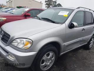 2002 Mercedes-Benz M-Class with VIN 4JGAB54E92A352889, listed as a IAAI auction lot 41805001 with 174,758 mi miles. Bid and sale history available at carsss.com. Image 6.