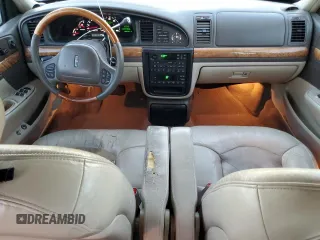 2000 Lincoln Continental with VIN 1LNHM97V0YY807253, listed as a Copart auction lot 80661834 with 130,398 mi miles and Salvage Title. Bid and sale history available at carsss.com. Image 8.