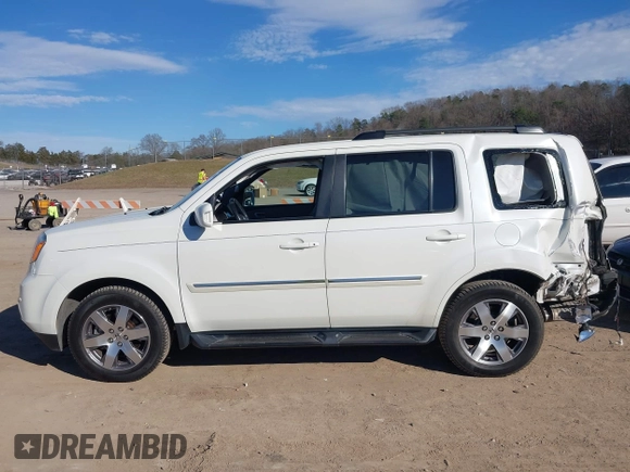 2015 Honda Pilot Touring with VIN 5FNYF3H97FB023842, listed as a IAAI auction lot 41673881 with 106,110 mi miles. Bid and sale history available at carsss.com. Image 14.