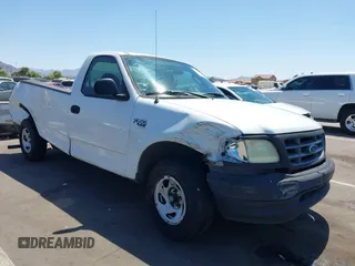 2003 Ford F-150 XL with VIN 2FTRF17W73CA77144, listed as a IAAI auction lot 42609120 with 102,490 mi miles and . Bid and sale history available at DreamBid. Image 1.