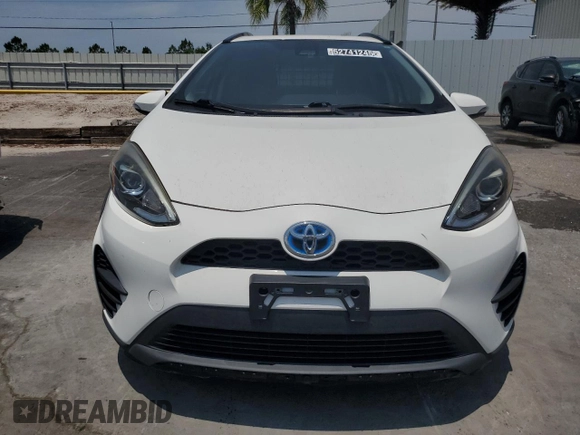 2018 Toyota Prius One z VIN JTDKDTB37J1615467, wystawiony jako Copart lot #52741245 z przebiegiem 63 666 mil mil oraz Czysty tytuł • Clean title. Historia ofert i sprzedaży dostępna na DreamBid. Obrazek 5.
