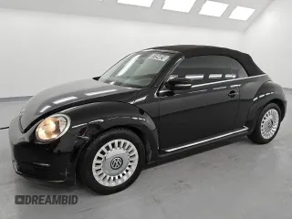 2014 Volkswagen Beetle 2.5L w/Sound/Nav with VIN 3VW5P7AT1EM805428, listed as a Copart auction lot 81594824 with 138,058 mi miles and Clean title. Bid and sale history available at DreamBid. Image 1.
