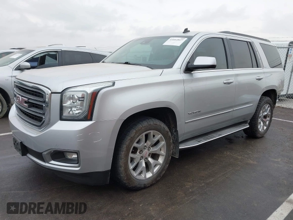 2015 GMC Yukon SLT with VIN 1GKS2BKCXFR131919, listed as a IAAI auction lot 41664827 with 149,398 mi miles. Bid and sale history available at carsss.com. Image 19.