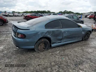 2005 Pontiac GTO z VIN 6G2VX12UX5L352121, wystawiony jako Copart lot #56840425 z przebiegiem 42 265 mil mil oraz Szkody całkowita. Historia ofert i sprzedaży dostępna na DreamBid. Obrazek 3.