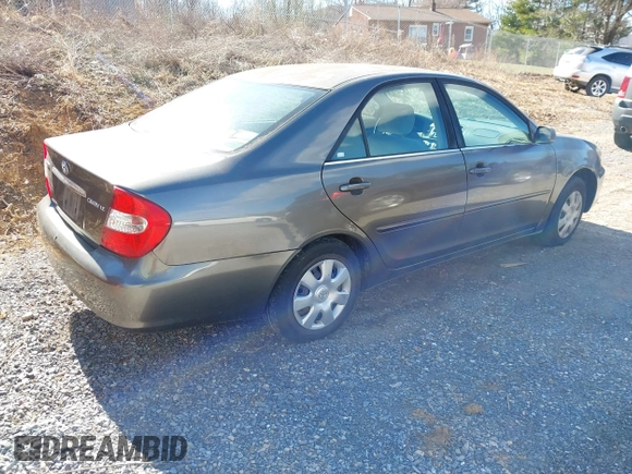 2004 Toyota Camry LE with VIN 4T1BE32K54U904138, listed as a IAAI auction lot 41792208 with 217,829 mi miles and . Bid and sale history available at carsss.com. Image 4.