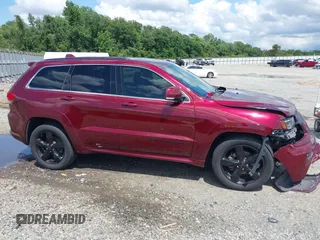 2016 Jeep Grand Cherokee Overland z VIN 1C4RJECG6GC401782, wystawiony jako IAAI lot #42442771 z przebiegiem 104 196 mil mil oraz . Historia ofert i sprzedaży dostępna na DreamBid. Obrazek 13.