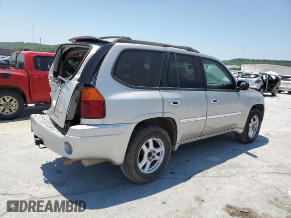 2007 GMC Envoy SLT with VIN 1GKDS13S472262069, listed as a Copart auction lot 59224264 with 126,464 mi miles and Salvage Title. Bid and sale history available at carsss.com. Image 3.