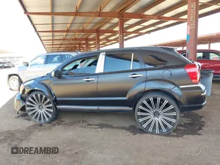 2010 Dodge Caliber SXT z VIN 1B3CB4HA3AD612829, wystawiony jako IAAI lot #42303635 z przebiegiem 230 191 mil mil oraz . Historia ofert i sprzedaży dostępna na DreamBid. Obrazek 13.