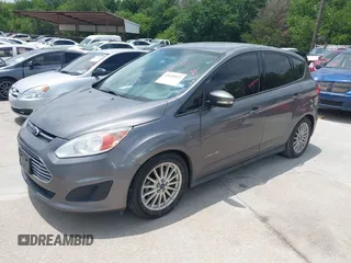 2013 Ford C-Max SE z VIN 1FADP5AU8DL556966, wystawiony jako IAAI lot #42420493 z przebiegiem 70 719 mil mil oraz . Historia ofert i sprzedaży dostępna na DreamBid. Obrazek 2.