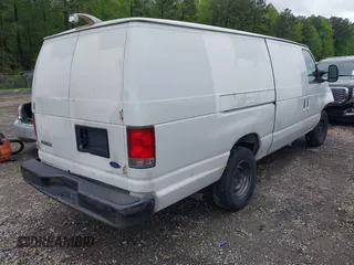 2006 Ford Econoline Cargo with VIN 1FTNS24W46DA75067, listed as a IAAI auction lot 42019008 with 479,196 mi miles. Bid and sale history available at carsss.com. Image 4.