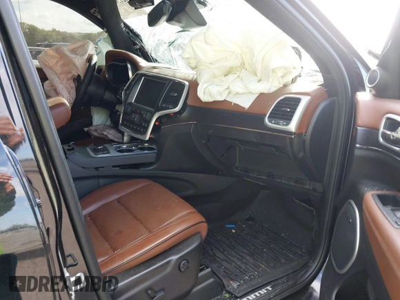 2018 Jeep Grand Cherokee Summit with VIN 1C4RJFJT5JC120523, listed as a IAAI auction lot 42136651 with 75,699 mi miles and . Bid and sale history available at DreamBid. Image 5.
