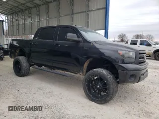 2011 Toyota Tundra 4WD Truck LTD with VIN 5TFHY5F11BX164277, listed as a Copart auction lot 86085284 with 196,307 mi miles and Salvage Title. Bid and sale history available at carsss.com. Image 4.