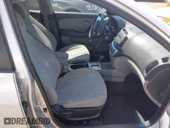 2009 Hyundai Elantra GLS with VIN KMHDU46D89U791032, listed as a IAAI auction lot 42127844 with 149,743 mi miles and . Bid and sale history available at DreamBid. Image 5.