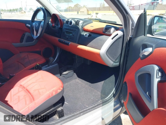 2008 Smart fortwo Pure with VIN WMEEJ31X78K180398, listed as a IAAI auction lot 42193886 with 98,136 mi miles and . Bid and sale history available at DreamBid. Image 5.