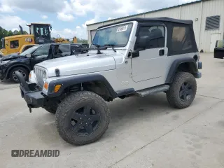 2005 Jeep Wrangler X with VIN 1J4FA39S55P353789, listed as a Copart auction lot 62469015 with 143,817 mi miles and Salvage title. Bid and sale history available at DreamBid. Image 1.