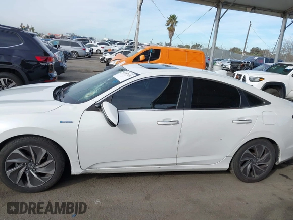 2021 Honda Insight Touring with VIN 19XZE4F97ME002699, listed as a IAAI auction lot 41397130 with 213,920 mi miles and . Bid and sale history available at carsss.com. Image 14.