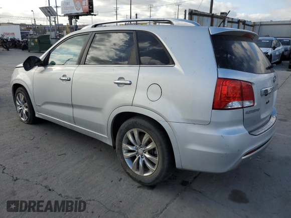 2012 Kia Sorento SX with VIN 5XYKWDA29CG302920, listed as a Copart auction lot 56237235 with 137,998 mi miles and Salvage title. Bid and sale history available at DreamBid. Image 2.