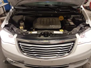2016 Chrysler Town & Country Touring-L with VIN 2C4RC1CG3GR284527, listed as a IAAI auction lot 41898213 with 198,148 mi miles. Bid and sale history available at carsss.com. Image 10.