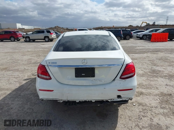 2019 Mercedes-Benz E-Class E 300 with VIN WDDZF4JB0KA512311, listed as a IAAI auction lot 41720142 with 93,714 mi miles. Bid and sale history available at carsss.com. Image 16.