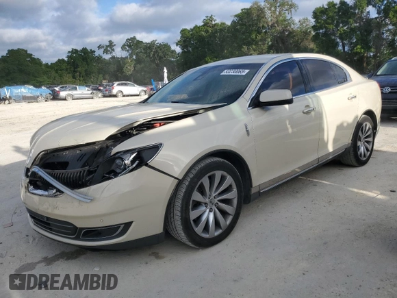 2014 Lincoln MKS with VIN 1LNHL9DKXEG612758, listed as a Copart auction lot 53230065 with 98,863 mi miles and Salvage Title. Bid and sale history available at carsss.com. Image 1.