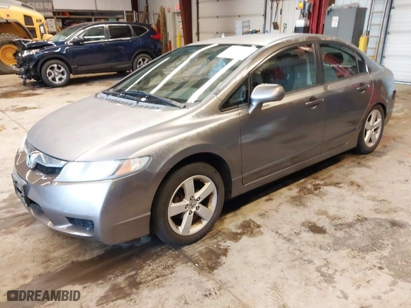 2010 Honda Civic Sdn LX-S with VIN 2HGFA1F69AH537117, listed as a IAAI auction lot 41960907 with 133,981 mi miles. Bid and sale history available at carsss.com. Image 2.