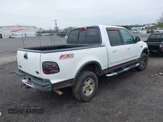 2003 Ford F-150 XLT with VIN 1FTRW08L43KA64328, listed as a IAAI auction lot 41932751 with 275,213 mi miles. Bid and sale history available at carsss.com. Image 4.
