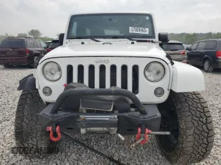 2014 Jeep Wrangler Unlimited Sahara with VIN 1C4BJWEG8EL266340, listed as a Copart auction lot 57809465 with 121,191 mi miles and Salvage title. Bid and sale history available at DreamBid. Image 5.