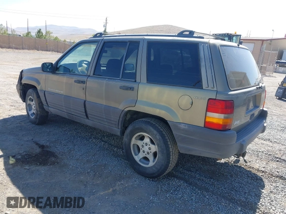 1997 Jeep Grand Cherokee Laredo with VIN 1J4GZ58S3VC603239, listed as a IAAI auction lot 42593915 with 295,696 mi miles and . Bid and sale history available at DreamBid. Image 3.