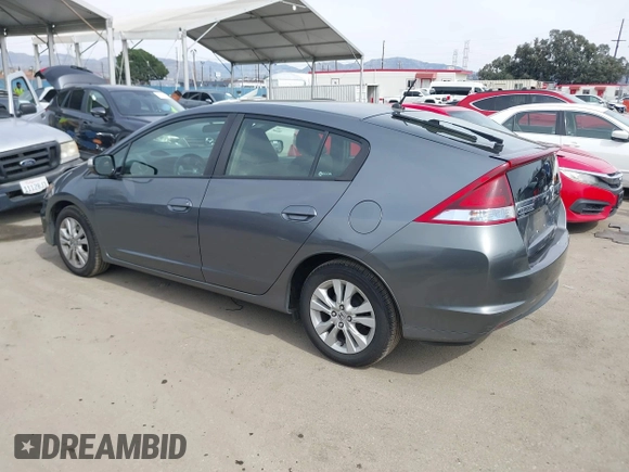2012 Honda Insight EX z VIN JHMZE2H73CS000751, wystawiony jako IAAI lot #41687288 z przebiegiem 181 593 mil mil oraz . Historia ofert i sprzedaży dostępna na DreamBid. Obrazek 3.