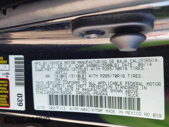 2015 Toyota Tacoma with VIN 3TMLU4EN2FM169326, listed as a IAAI auction lot 40689500 with 77,003 mi miles and . Bid and sale history available at DreamBid. Image 9.