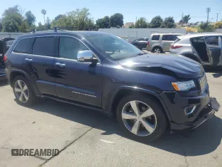 2015 Jeep Grand Cherokee Overland with VIN 1C4RJFCG0FC629863, listed as a Copart auction lot 63098475 with 92,426 mi miles and Salvage title. Bid and sale history available at DreamBid. Image 4.