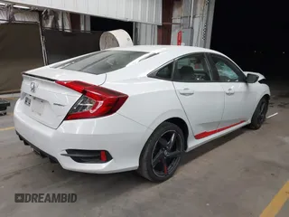 2019 Honda Civic Sport with VIN 2HGFC2F89KH533782, listed as a IAAI auction lot 41761079 with 78,878 mi miles and . Bid and sale history available at DreamBid. Image 4.