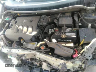 2007 Nissan Versa S z VIN 3N1BC13E17L408911, wystawiony jako IAAI lot #39637191 z przebiegiem 111 583 mil mil oraz . Historia ofert i sprzedaży dostępna na DreamBid. Obrazek 10.