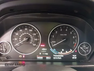 2014 BMW 3 Series 328i xDrive with VIN WBA3B3G50ENR83599, listed as a IAAI auction lot 42106340 with 195,309 mi miles. Bid and sale history available at carsss.com. Image 7.