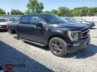 2021 Ford F-150 XL with VIN 1FTFW1E81MFA80456, listed as a Copart auction lot 61268545 with 57,233 mi miles and Salvage title. Bid and sale history available at DreamBid. Image 4.