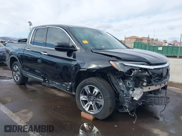 2017 Honda Ridgeline RTL-E with VIN 5FPYK3F7XHB030565, listed as a IAAI auction lot 41795386 with 79,252 mi miles and . Bid and sale history available at DreamBid. Image 6.