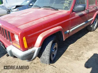 1999 Jeep Cherokee Sport with VIN 1J4FF68S4XL552718, listed as a IAAI auction lot 41443871 with 310,874 mi miles. Bid and sale history available at carsss.com. Image 6.