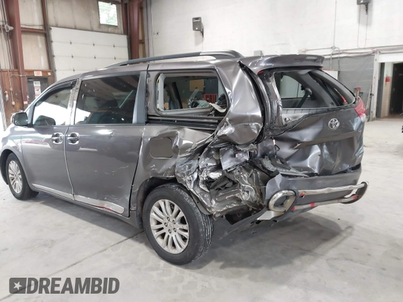 2011 Toyota Sienna XLE AAS with VIN 5TDYK3DC0BS063232, listed as a IAAI auction lot 42433187 with 198,252 mi miles and . Bid and sale history available at DreamBid. Image 3.