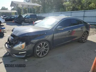 2015 Volvo S60 T5 Drive-E Premier with VIN YV140MFK2F1350695, listed as a Copart auction lot 53275725 with 98,962 mi miles and Salvage title. Bid and sale history available at DreamBid. Image 1.