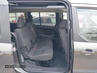 2015 Ford Transit Connect XLT z VIN NM0GE9F71F1184535, wystawiony jako IAAI lot #41949582 z przebiegiem 117 702 mil mil oraz . Historia ofert i sprzedaży dostępna na DreamBid. Obrazek 8.